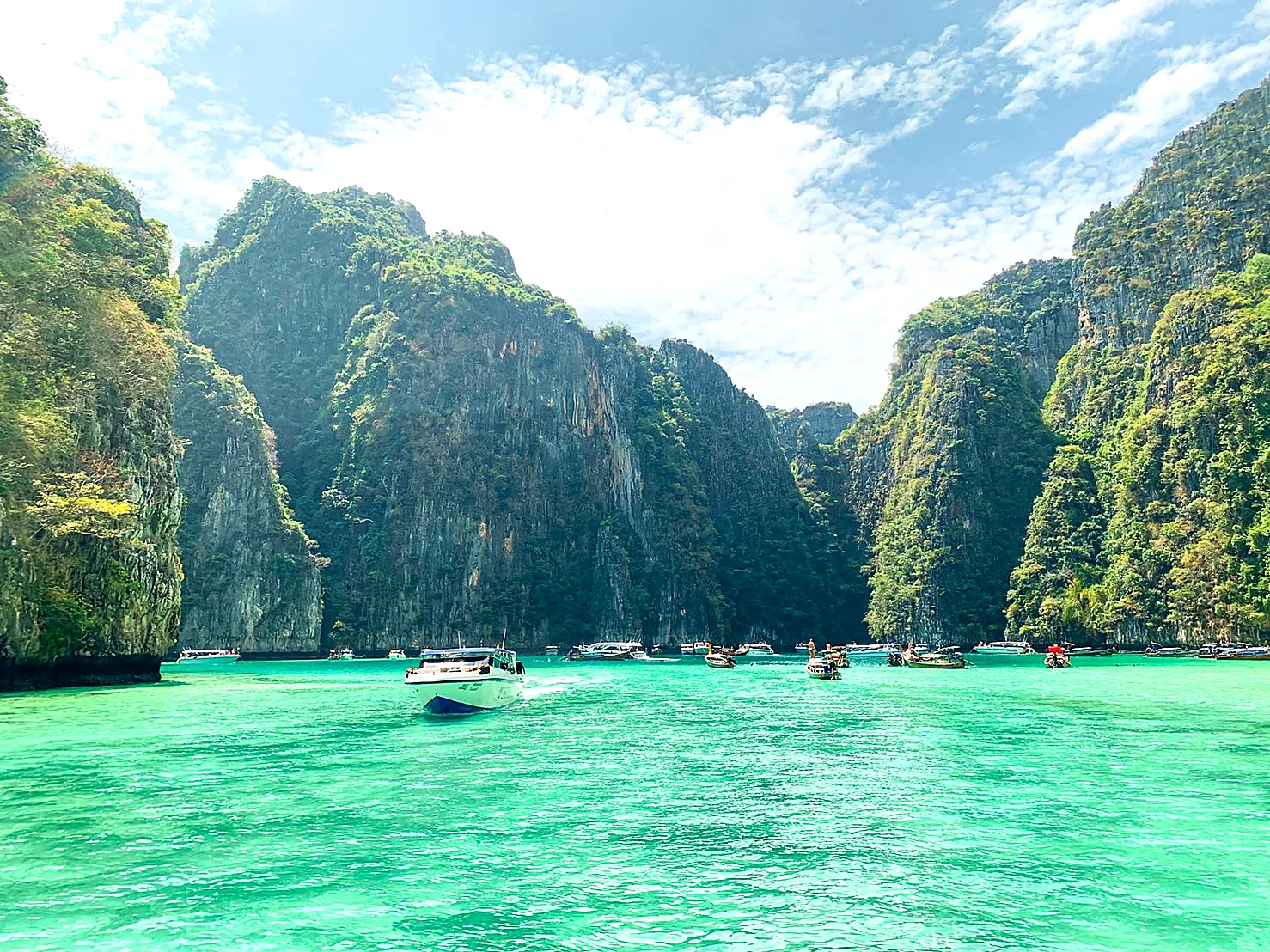 Pileh Lagoon surrounded by tall green cliffs